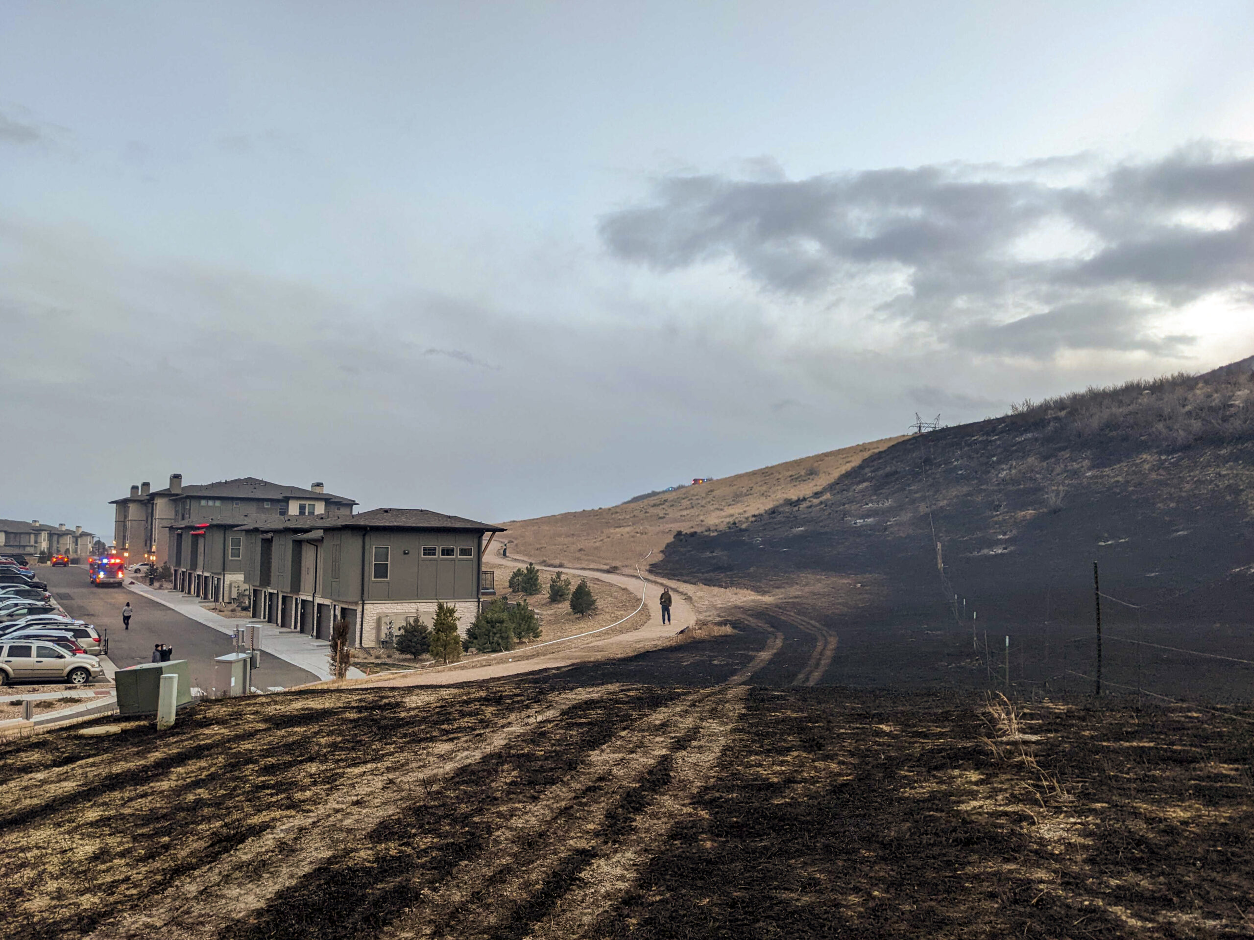 A grass fire burns near Chatfield State Park in Littleton on Monday, December 27, 2021.