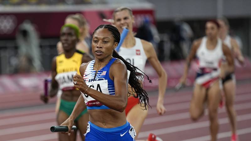 Allyson Felix, of the United States, runs in the women's 4 x 400-meter relay at the 2020 Summer...