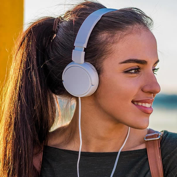 Portrait of a woman with headphones on