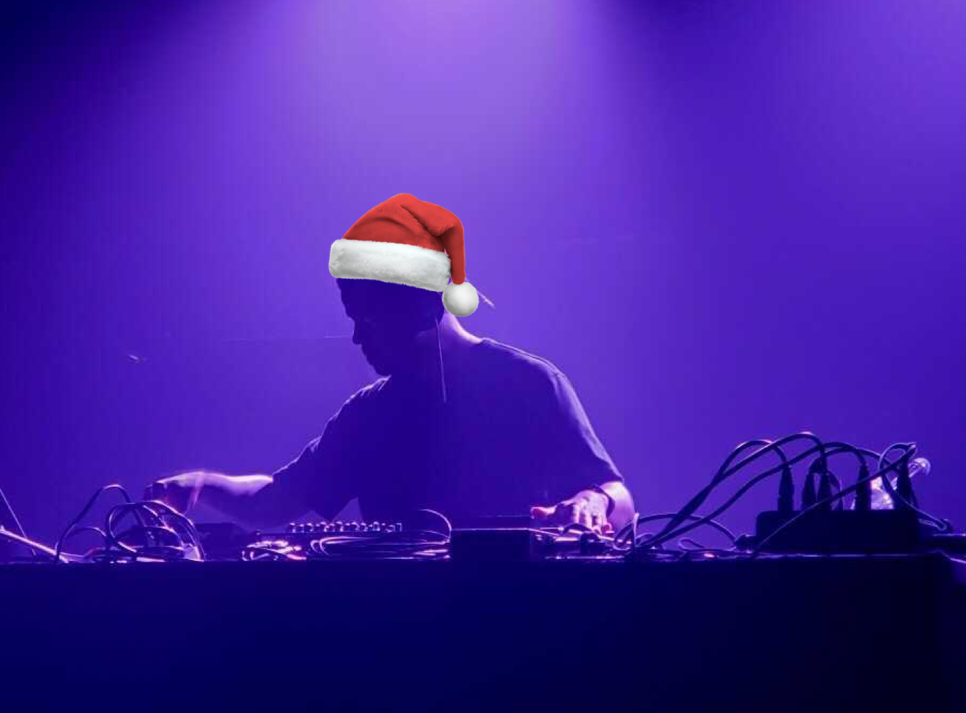 Bobby Carter DJs wearing a santa hat