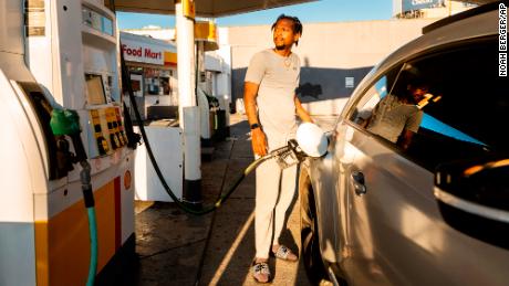 A motorist fills up at a Shell station on Monday, Nov. 22, 2021, in San Francisco, where regular unleaded gasoline was selling for $5.85 per gallon. 