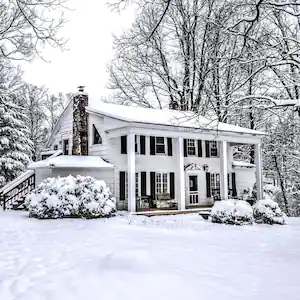 A vintage old house in fresh snow