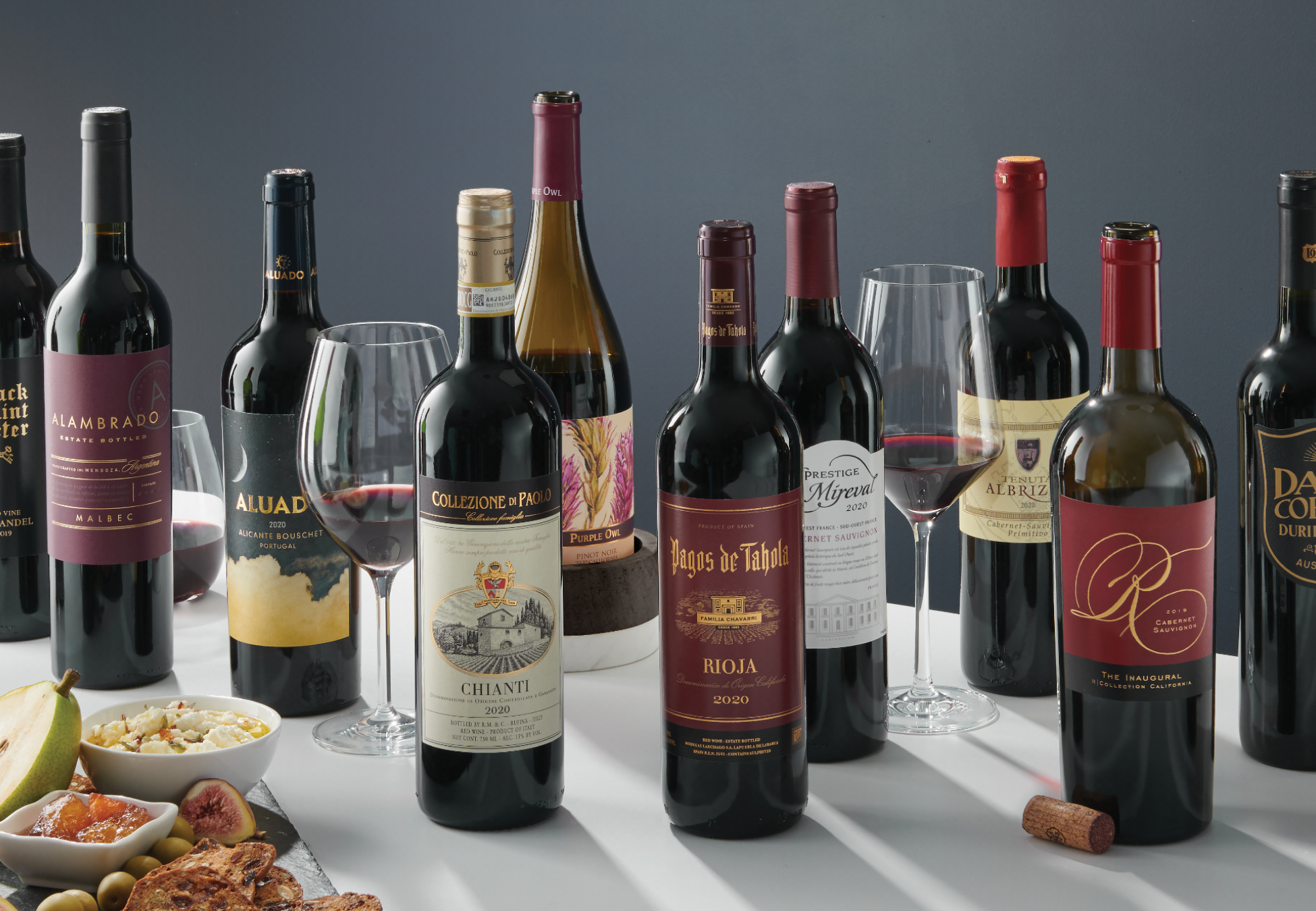 Top 12 Wines + 2 Bonus Bottles & Glasses for $69.99