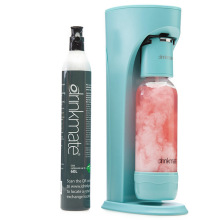 Blue soda maker with plastic bottle of pink liquid attached next to drinkmate tank.