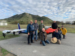 Maj. Nicholaus Carrea, Air Education and Training Command’s Detachment 62, Lt. Col. Andrew Anderson, AETC’s Det. 62, Capt. Terrence McKenna, Agility Prime and Dr. Stephen Ellis, AETC’s Det. 62, stand in front of an electric Vertical Takeoff and Landing aircraft at the Kitty Hawk Corporation’s facility in Palo Alto, Calif. The AFWERX Agility Prime program took another step forward in December with the first government remotely piloted flight of an eVTOL aircraft. (Courtesy photo)