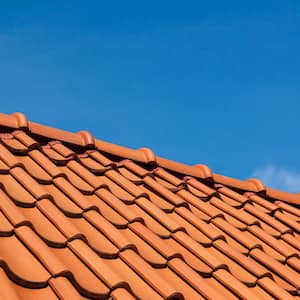 roof tile pattern, close up, over blue sky