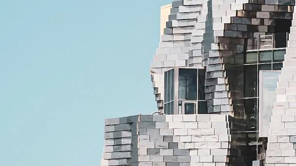 Modern building with balcony and windows