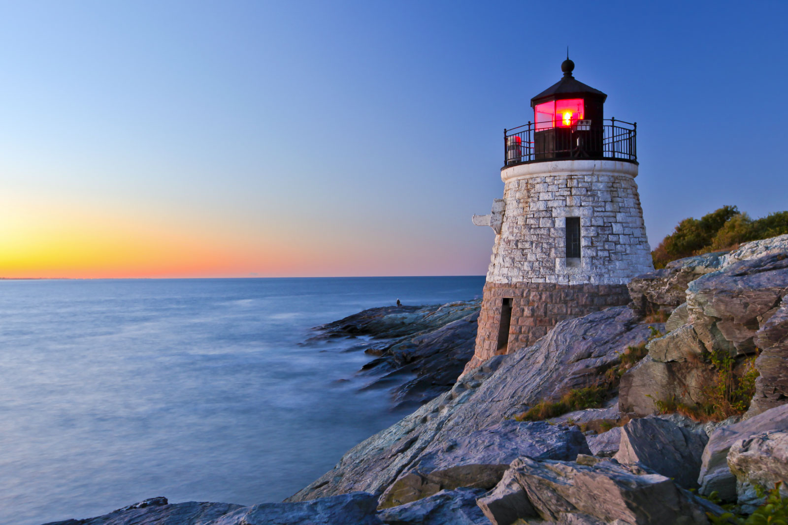 A lighthouse on a rocky coastline