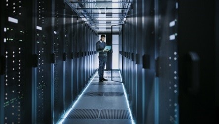 Man standing in a server room