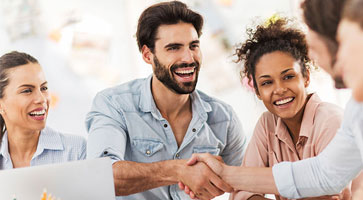 group of people shaking hands