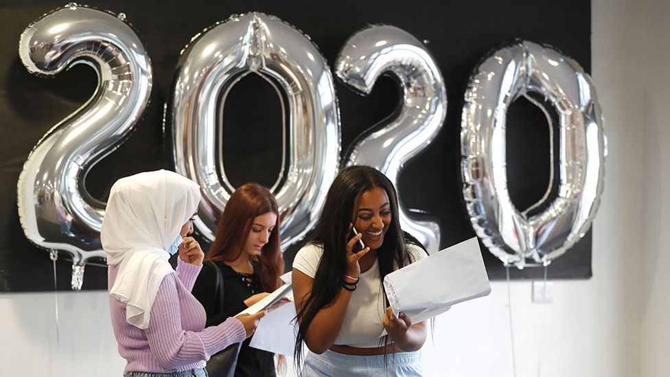 Girls looking happy about their GCSE results