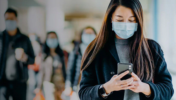 Woman looking at her cell phone