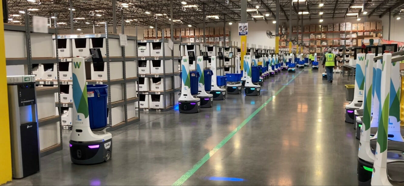 locusbot assisting with orders in the warehouse