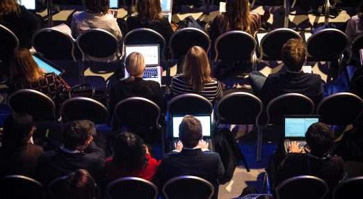 A group of people attending a conference