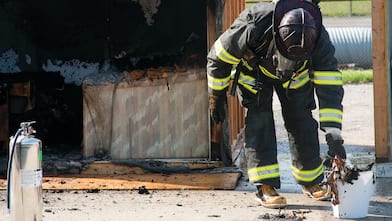 firefighter at controlled burn in Indianapolis