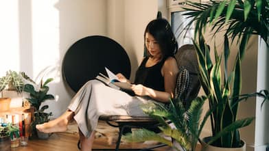 A woman reading at home