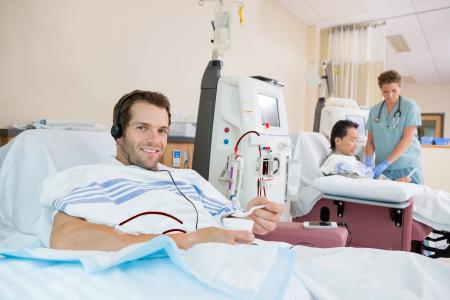 Young man undergoing dialysis.