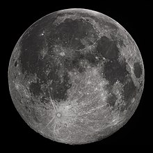 Full Moon in the darkness of the night sky. It is patterned with a mix of light-tone regions and darker, irregular blotches, and scattered with varying sizes of impact craters, circles surrounded by out-thrown rays of bright ejecta.