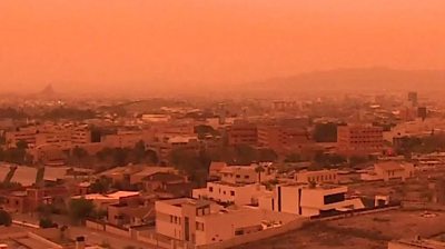 Bright orange sky over Murcia