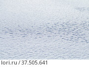 Melting snowdrift surface on a sunny day, natural photo. Стоковое фото, фотограф EugeneSergeev / Фотобанк Лори