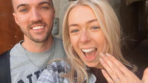 Leah Washington with her ring and Joe Pugh