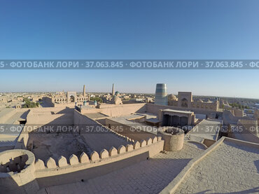 Aerial view on streets of the old city and unfinished minaret Kalta Minor. Uzbekistan. Khiva