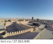 Aerial view on streets of the old city and unfinished minaret Kalta Minor. Uzbekistan. Khiva (2015 год). Стоковое фото, фотограф Куликов Константин / Фотобанк Лори