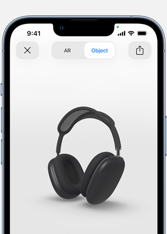 Afbeelding van spacegrijze AirPods Max in AR-scherm op iPhone.