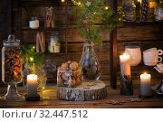 Christmas decoration cocoa bar with cookies and sweets on old wooden background in natural rustic style. Winter cozy concept. Стоковое фото, фотограф Майя Крученкова / Фотобанк Лори