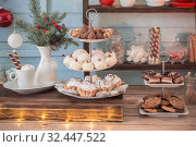 Christmas bar cacao decoration with cookies and sweets on blue wooden background in vintage style. Стоковое фото, фотограф Майя Крученкова / Фотобанк Лори