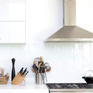 A white modern kitchen with a exhaust fan