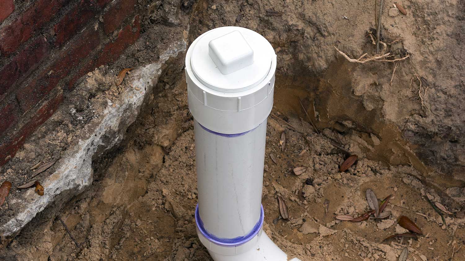 Sewer pipe cap in the ground