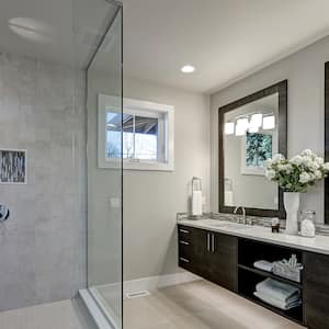 large gray bathroom with stone tile