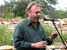 Hitchens speaking from a lectern