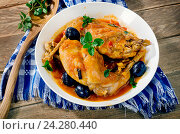 Stewed rabbit legs with olives and herbs. Стоковое фото, фотограф Tatjana Baibakova / Фотобанк Лори