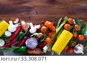 Fresh vegetables assortment with mushrooms on natural wooden desk. Стоковое фото, фотограф Яков Филимонов / Фотобанк Лори