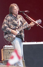 Neil Young performing in 1996