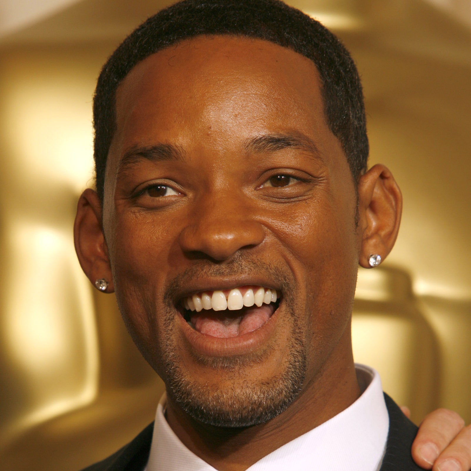 Image may contain Tie Accessories Accessory Human Person Face Will Smith Suit Coat Clothing Overcoat and Apparel