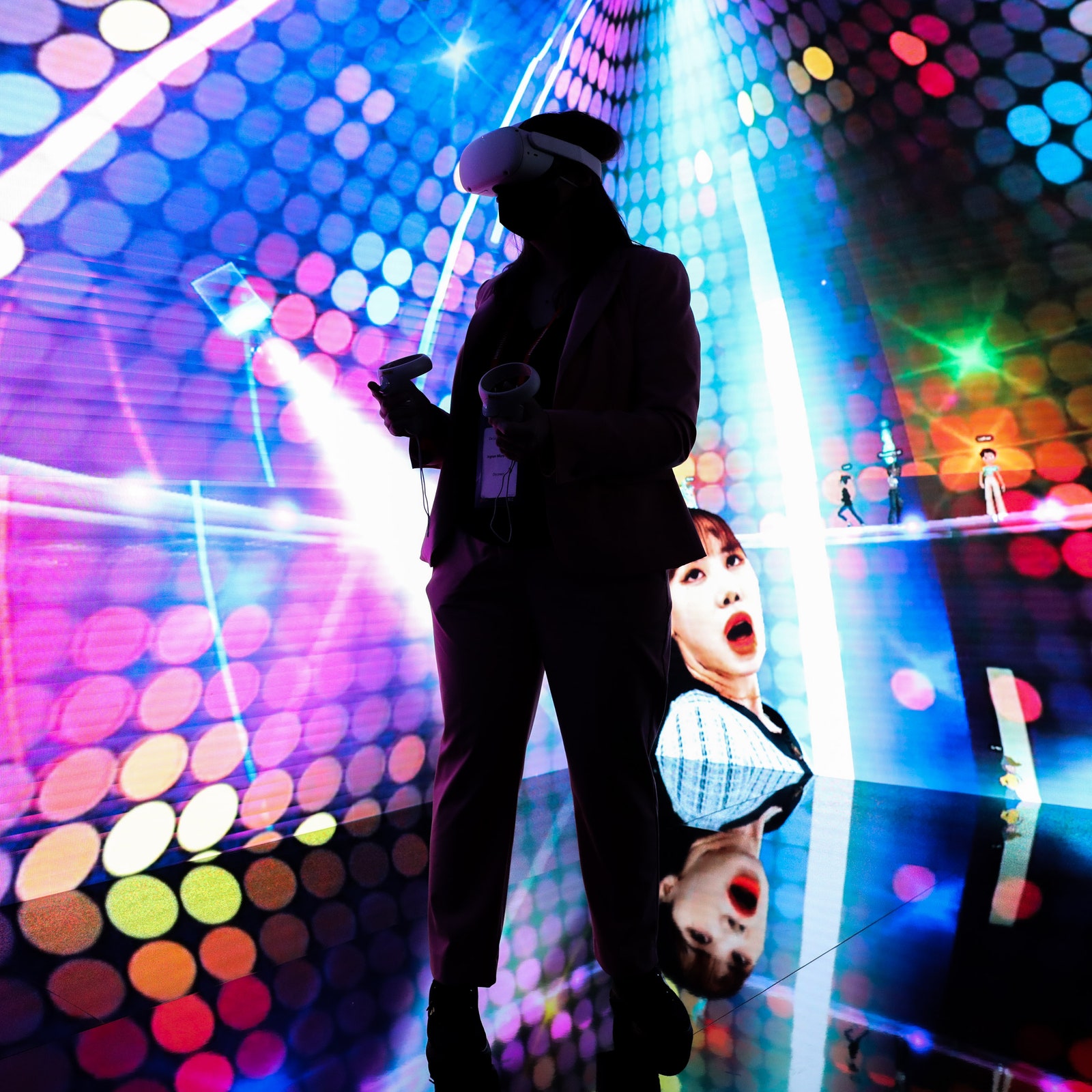 An attendee wearing a virtual reality  headset takes part in a concert experience in the metaverse at the SK Telecom Co....