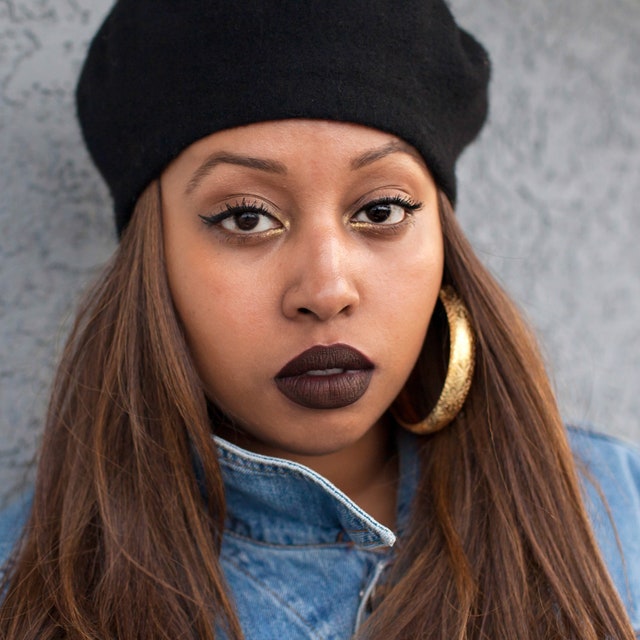 Image may contain Face Human Person Warsan Shire Clothing and Apparel