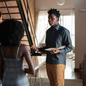 A property manager showing an apartment to a couple