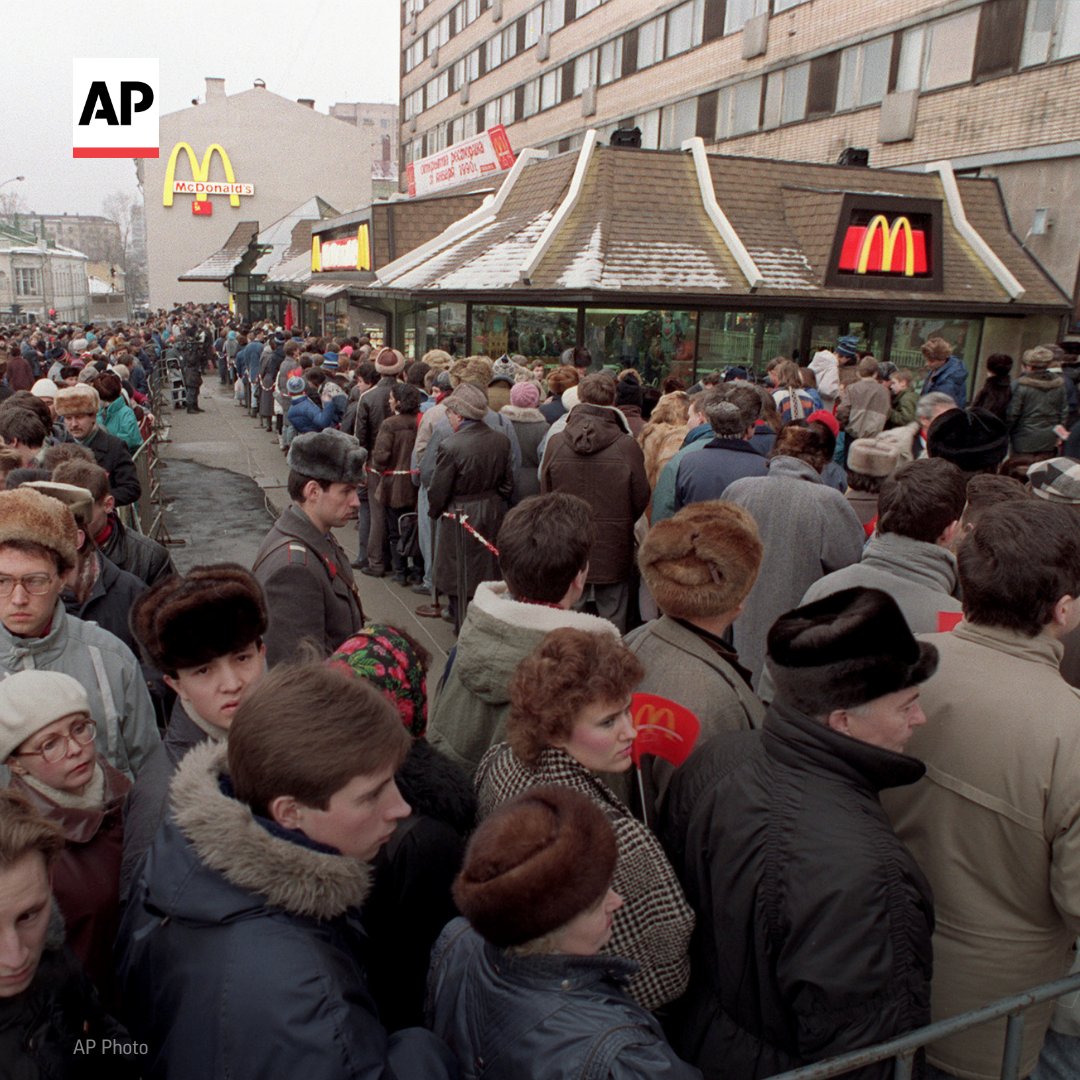 Hundreds of people line up outside the McDonald's in Moscow on its opening day in 1990.