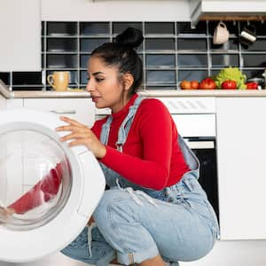 Woman front load washer