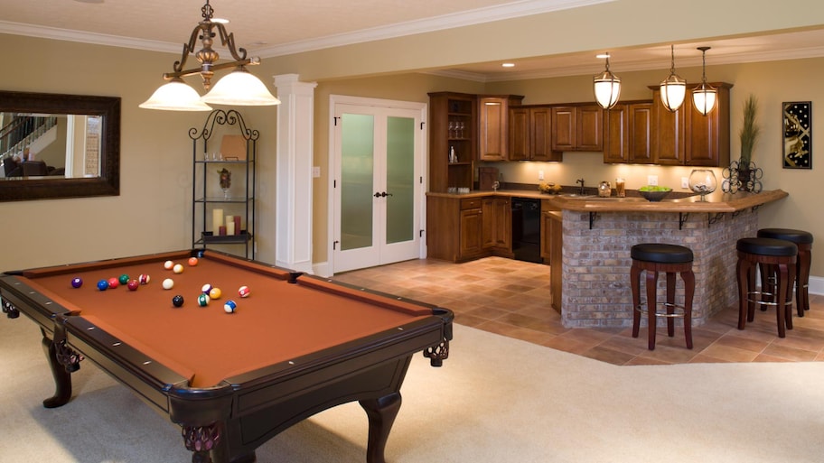 Game room and bar in basement home