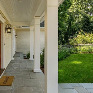 A beautiful front porch with an array of columns