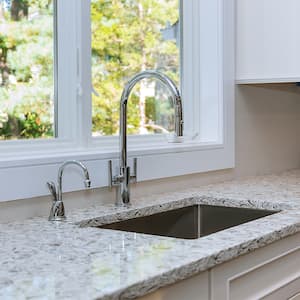 white kitchen with marble effect countertop