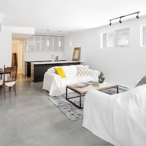 A bright open plan living room basement