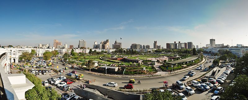 A view of a road at Connaught Place showing busy traffic.