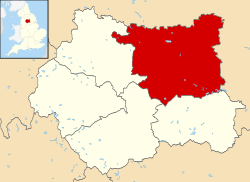 England map coloured pink showing its administrative subdivisions. Leeds metropolitan borough is coloured red.