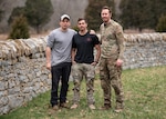 Three pararescuemen from the Kentucky Air National Guard's 123rd Special Tactics Squadron rescued a drowning child at a pool in Louisville, Ky., March 15, 2022. Master Sgt. Elmer Quijada, left; Tech. Sgt. Ryan Penne, center; and Master Sgt. Devin Butcher, who were conducting unrelated training at the pool and are certified paramedics, administered life-saving aid to the child, who had stopped breathing.